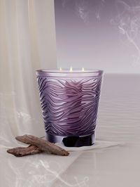 The draperies sculpt the world of Vesper, creating a moment of pure poetry. Discover the new Mirage crystal candle in soft, dusky violet tones.