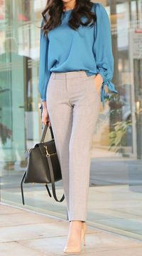 This outfit looks professional becuase of the long sleeves and the bright color is pleasing to the eye.