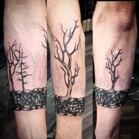 Jesse Lewis @lewcid_ink - Revamp of Dave's existing celtic band today - plus some! Some filler trees and finishing touches still - but great first session - thanks for sitting like a rock today, looking forward to having you back in! Swipe right for a before :) #lewcidink #celtictattoo #celticarmband #treestattoo #coveruptattoo #blackworktattoo #forearmtattoo #wraptattoo #firstsession - Insta Stalker