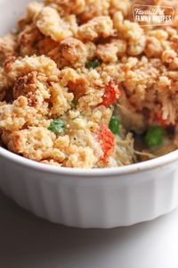 Chicken Pot Pie Casserole takes a hearty creamy chicken and vegetable filling and adds a crunchy Parmesan crumble on top. A delightful twist on a traditional favorite! #chicken #chickenrecipe #chickendinner #chickenpotpie #potpie #chickenpotpiecrumble #FavoriteFamilyRecipes #favfamilyrecipes #FavoriteRecipes #FamilyRecipes #recipes #recipe #food #cooking #HomeMade #RecipeIdeas