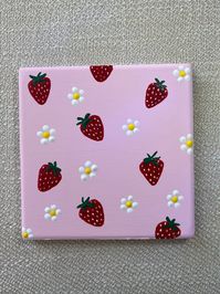 4x4 ceramic hand painted strawberry coaster. Sealed with a glossy water resistant finish and a layer of cork on the bottom to prevent sliding and movement on flat surfaces.