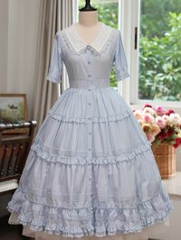 Step into the world of timeless charm with our Blue Front Button Placket Classic Lolita Dress. This exquisite piece is designed to capture the essence of classic Lolita fashion, featuring intricate ruffle trim and delicate pleating details that exude sophistication and grace.  The dress boasts a beautifully crafted front button placket, adding a touch of vintage allure, while the rich purple hue brings a regal elegance to your wardrobe. The removable bowtie on the neckline offers versatility, allowing you to customize your look to suit any occasion.  Perfect for tea parties, cosplay events, or simply adding a touch of whimsy to your everyday attire, this Lolita dress promises to make you feel like the heroine of your own fairytale. Embrace the beauty of classic Lolita fashion with this stu