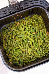 How to cook frozen green beans in air fryer, boiled, in the microwave, or in the oven. Frozen vegetables to tender for this healthy side dish