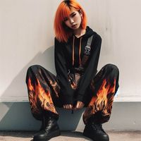 orange hair, darkwear fashion outfit, harem pants with flame design