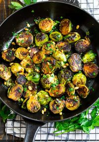 Crispy Balsamic Sauteed Brussels Sprouts - easy and healthy brussels sprouts recipe that takes just 15 minutes! Quick, fresh and delicious. Top with Parmesan and bacon, or keep it vegan. This will be your new favorite side dish recipe! 