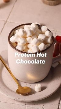 This Protein Hot Chocolate Recipe is the perfect healthy holiday treat! Made with cocoa powder & chocolate protein powder, it serves up all the chocolatey goodness you'd expect from traditional hot chocolate, with the extra added benefits of protein & no added refined sugars. Serve this cozy hot drink at your next holiday party or enjoy it snuggled up by the fire during the winter months!