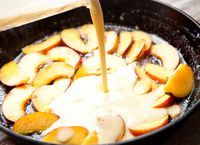 Fresh peach dutch baby.