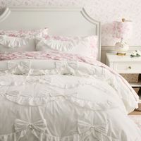 Beautifully textured with delicate bows, this quilt gives your sleep space an extra dose of sweet style.