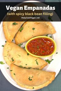 These incredibly flavorful vegan empanadas have a flaky, crispy wrapper encasing a spicy filling of black beans, potatoes and more veggies. They are baked, not fried. Serve with a zesty salsa for a filling snack or meal!