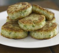 Bubble and squeaks cakes! Potatoes and Brussels sprouts. Butter, salt and pepper.