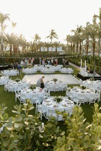 Mackenzie and Anthony tied the knot in Southwest Florida at the beautiful Hyatt Coconut Point Resort. This lavish resort is a tropical oasis located in Bonita Springs, near Naples, Florida. The couple chose an incredible waterfront location for their wedding ceremony and reception. They decided to mix classic modern elements and white roses with simple green tropical touches. and Engagement Photos by Destination Photographer, Grace Torres Photo.