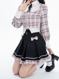 Get the perfect mix of collegiate charm and cute style with our pink plaid long-sleeve blouse and black high-waist box pleat skirt set. The pink plaid long-sleeve blouse adds a touch of whimsy with its playful design, while the black high waist box pleat skirt exudes sophistication and elegance. This set is perfect for those who love the "fake two-piece" look, and can be mixed and matched with other items for a variety of stylish outfits.  Please note that this set includes the blouse and skirt only.  Free Tie(not for sale)  Blouse   	 		 			Size 			S 			M 			L 			XL 		 		 			Bust 			83 			87 			91 			95 		 		 			Full Length 			45 			46.5 			48 			49.5 		 		 			Shoulders 			33 			34 			35 			36 		 		 			Waist 			64 			68 			72 			76 		 		 			Sleeve Length 			60.5 			61 			61.5 			62