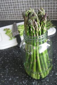 Asparagus keep it fresh cut off ends-2 inches of water-loosely wrap with plastic baggie. Claims up to 2 weeks