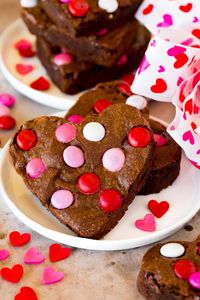 These Valentine brownies are rich and fudgy homemade brownies loaded with chocolate and M&M’s, then baked to perfection and cut into heart shapes.