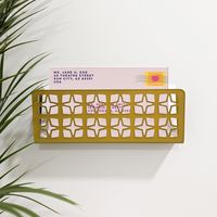 "Rock those mid century vibes while keeping your mail and keys organized in style with this breeze block inspired mail holder. Need to also keep your keys handy? Choose the option with three magnets on the underside. Each is laser cut and bent by hand so they are all truly one of a kind. Easy to hang on two screws (not included.) MATERIALS & DIMENSIONS Matte Acrylic  9.5\"w x 3.5\"h x 2\"d (approx. dimensions as each piece is hand bent into shape.) PACAKAGING & SHIPPING Items are handmade and re