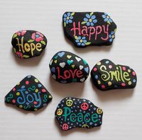 These hand painted rocks, with their bright, vivid colors, are sure to inspire everyone who sees them! Each rock measures approximately 1.5-2.5 inches. Includes the following Rocks: Happy Hope Smile Love Joy Peace Lakeshore Rock Art handpicks each rock from the shores of Lake Michigan. And since no two rocks are the same, we can GUARANTEE that your Rock Art is 100% UNIQUE! Because of this uniqueness, your final product will look slightly different than the photo above. We do our best to make it