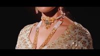 Celebrate togetherness with our Bandhai khaka moti choker and pair it with a gold embellished lehenga giving a royal vintage feel. Additionally, you can also wear this small choker as an armlet to make your look edgy and artistic.