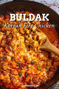 This buldak recipe is a popular Korean street food made with chicken cooked in a fiery gochujang sauce, often topped with melty cheese, easy to make!