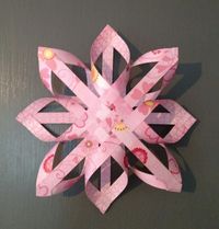 Step by Step picture tutorial for making paper star with directions.