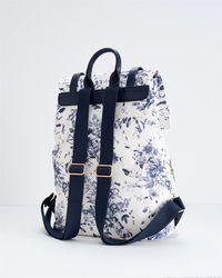 Our Martha Large Backpack will soon become your daily staple. The application of our Blooming Toile print featuring clusters of delicate bouquets arranged amongst trailing vines, dotted with dragonflies, bees and butterflies in a calming palette of tonal blues, will bring added joy to everyday trips. With a zipped fr