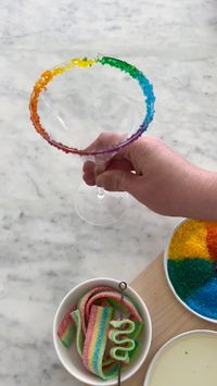 Add a colourful twist to your cocktail game with this easy-to-follow tutorial for Rainbow Sugar Rimmed Cocktail Glasses. Perfect for Pride parties, summer celebrations, or just because!