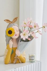 Meet the Sunny Flower Vase - The elegant girl that will bring style to your home!

She is a great dose of fun in your home décor! Perfect for greeting you in your hallway or kitchen. It will bring identity to your space while nurturing calm emotions embroidered in her design. This pretty hand-painted décor piece will be a great conversation starter in your living room!

So whether you are looking for a gift for a friend, or for a new flower vase for your home - she is a no-doubt choice!