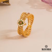 Indulge in timeless elegance with our Antique 22k Floral Kada. Featuring a striking floral motif at the center, this kada exudes traditional charm and a curvy, trendy appeal. Crafted to perfection, it's an ideal choice for special occasions, adding a touch of heritage and sophistication to your ensemble.