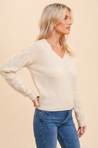 Not Just another Sweater!! Indulge in the luxurious comfort of our Bringing Joy Back Tie Sweater. Showcasing a delicate V-neck and elegant cable knit, this cream colored pullover exudes sophistication. With its unique back tie detail, it adds a touch of refinement to your wardrobe. Elevate your style and bring joy back to your outfits. 64% Polyester 23% Acrylic 13% Nylon Tie Back Sweater