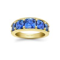 This Cushion Cut Sapphire Eternity Ring by Hattie Rickards is the perfect ocean blue. Find more on thecutlondon.com