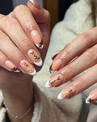 Check out these 33+ nail design ideas with gingerbread nail art, perfect manicure for the holidays! Add a festive flair to your holiday season with Gingerbread Christmas nails. With designs ranging from acrylic to intricate art, and simple to sophisticated art designs, we cater to red, house, almond, or short nail enthusiasts. Pink lovers, rejoice! Pin this for festive inspiration and find more ideas in our article.