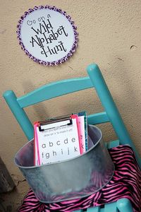 Summer Scavenger hunt bucket on a chair & clipboards