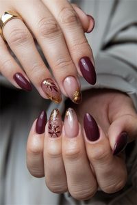 Embrace the beauty of autumn with these stunning acrylic ombre fall nail ideas. Picture rich burgundy fading into a warm gold, capturing the essence of falling leaves. This chic style not only enhances your look but also reflects the cozy vibes of the season. Perfect for any occasion, these nails will have you turning heads and feeling festive. Elevate your fall aesthetic with this gorgeous design!