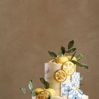 d e b b i e c a k e . on Instagram: "Limoncello vibes ~ semi-naked cake with hand made lemons, slices and painted tiles. . . #birthdaycakeideas #lemoncake #seminakedcake #buttercreamcakes"