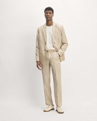 About This Style. This piece features a single-breasted, tailored fit with shoulder pads, front welt pocket at chest, and front flap welt pockets, in linen.