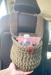 Cute car accessory, car accessories boho , car slouch pouch  This crochet basket or organizer basket has different uses in your car, because it's perfect to holder things that you need to have close while you go in your car (water bottles, hands sanitizers, gloves and scarves, napkins, cellphone) or it can be use like a car trash bag for papers such as receipts, straw wrappers, candy wrappers, and more.   This storage basket is made from original 100% recycled textile yarn made of superior quali