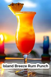 Indulge in the flavors of the Caribbean with this easy-to-make Island Breeze Rum Punch! A delightful blend of Captain Morgan Spiced Rum, Myers's Dark Rum, passion fruit, pineapple, and orange juices, this cocktail is the perfect addition to your next gathering. #RumPunch #TropicalCocktail #CaribbeanDrinks