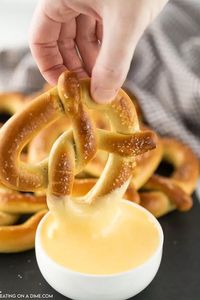 This is an easy cheese sauce for pretzels. This pretzel cheese dip sauce is simple to make with just a few ingredients. This is the best pretzel cheese sauce recipe! #eatingonadime #pretzelcheesesauce #pretzelcheesedip #cheesedip