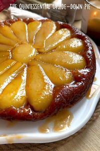 Indulge in the classic French dessert, Pear Tarte Tatin. This delightful upside-down pie features caramelized pears and a buttery, flaky crust, making it the perfect sweet treat for any occasion.  Ingredients: For the Dough:      100g Cold Butter     200g Wheat Flour     1 tbsp Sour Cream     1 Egg     1 tbsp Sugar     1/2 tsp Baking Powder     A pinch of Salt  For the Filling:      50g Butter     50g Sugar     5 Pears     Optional: Cinnamon  Instructions: Create shortbread dough by mixing cold butter with flour, then add sour cream, egg, sugar, baking powder, and salt. Chill 30 mins. Peel, core, and quarter pears. Caramelize in butter and sugar, cool. Cover with dough, bake at 170°C (338°F) for 35 mins. Invert onto a plate and serve warm, ideally with ice cream. Enjoy!    #PearTarteTatin