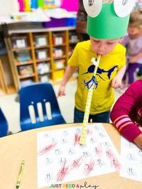 This hands on alphabet activity is perfect for your preschool pond theme. Children act as frogs trying to catch alphabet flies. Grab the free printable that makes the perfect alphabet worksheet alternative since it's hands on and fun!