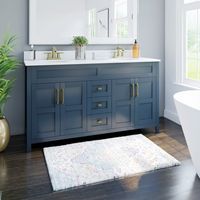 This double sink bathroom vanity offers a timeless, traditional look for your bathroom. Not only does it feature elegant style, form and function come together with ample cabinet space and an adjustable shelf within each cabinet for flexible storage. Three drawers between the two cabinets offer added storage for small items like extra toothpaste, hairbrushes, and more. Soft-close door hinges help ease doors shut to make slamming cabinets a noise of the past. For even more ease of use, this vanit