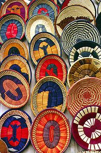 Colorful woven baskets at a crafts market in Nairobi suburbs. Kenya..Basketry Art#Basketry Art #Basketry #Basket #Art #Craft#weave