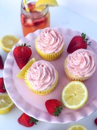 Strawberry Lemonade Cupcake Recipe. Lemon cupcakes with strawberry puree buttercream frosting. Beautiful summer dessert