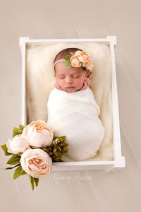 Natural newborn baby girl pictures photography session flowers white ivory cream neutral Houston photographer