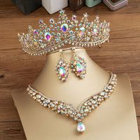 Outshine Them All, My Darling With This Stunner.   Own your royal, feminine, divine nature. Wear this spectacular crown, necklace, earring set to class, a concert, a fancy dinner party. You can even wear this crown to the office. You might say, "What? I would never wear a crown to the office or school." But you would b