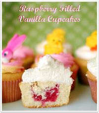 Raspberry Filled Vanilla Cupcakes with Butter Cream Frosting