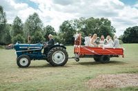 Tractor & Trailer Wedding Transport - Kelsie Low Photography | Colourful Outdoor Wedfest Tipi Wedding