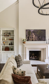 Shelf Modern Bolection Fireplace Mantel in cast stone by Artisan Kraft. Shop our link below for more stone fireplace surrounds. Photo and design by Park & Oak