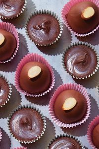 These easy homemade treats—shown here in foil liners—make a sweet gift for the chocolate-peanut butter lover in your life. You can also replace the peanut butter with tahini, if you like.