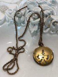 Art Nouveau/ Victorian Gold Tone Locket Necklace with Initials E G H on Back Marked W & H inside. Some wear around edges and some dull stones .