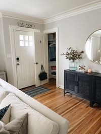 How to Decorate When Your Front Door Opens Into Living Room - The Inspired Room